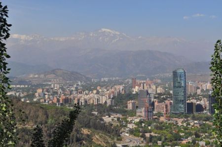 Las Condes and uphill suburbs of Santiago, backed by the snow capped Andes, from San Cristobal hill
